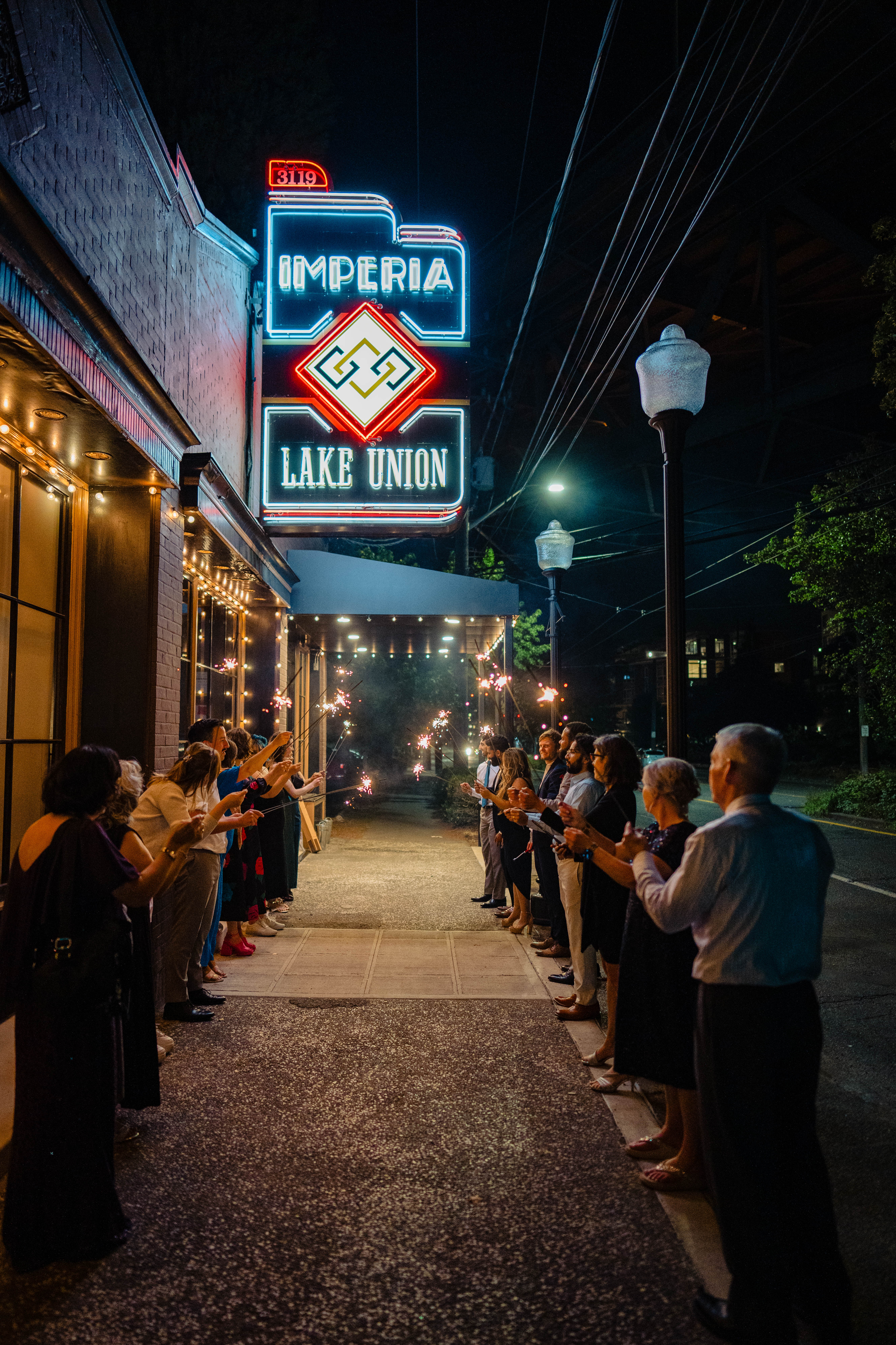 Imperia Lake Union neon sign lit up at night
