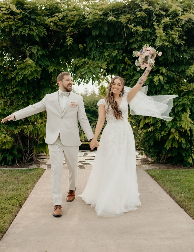 Couple Walking down the Isles