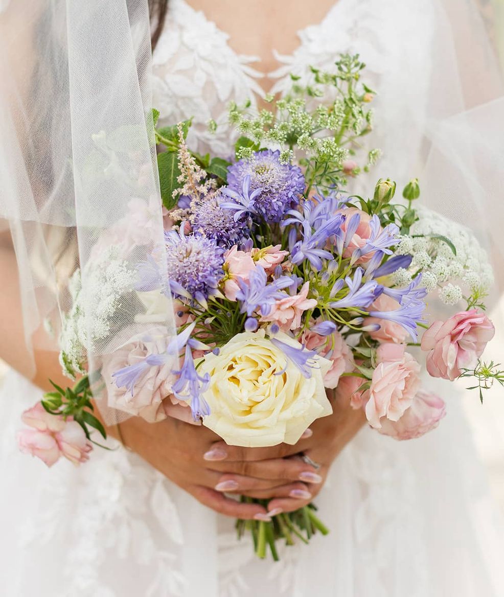 Bride with a bundle of flowers