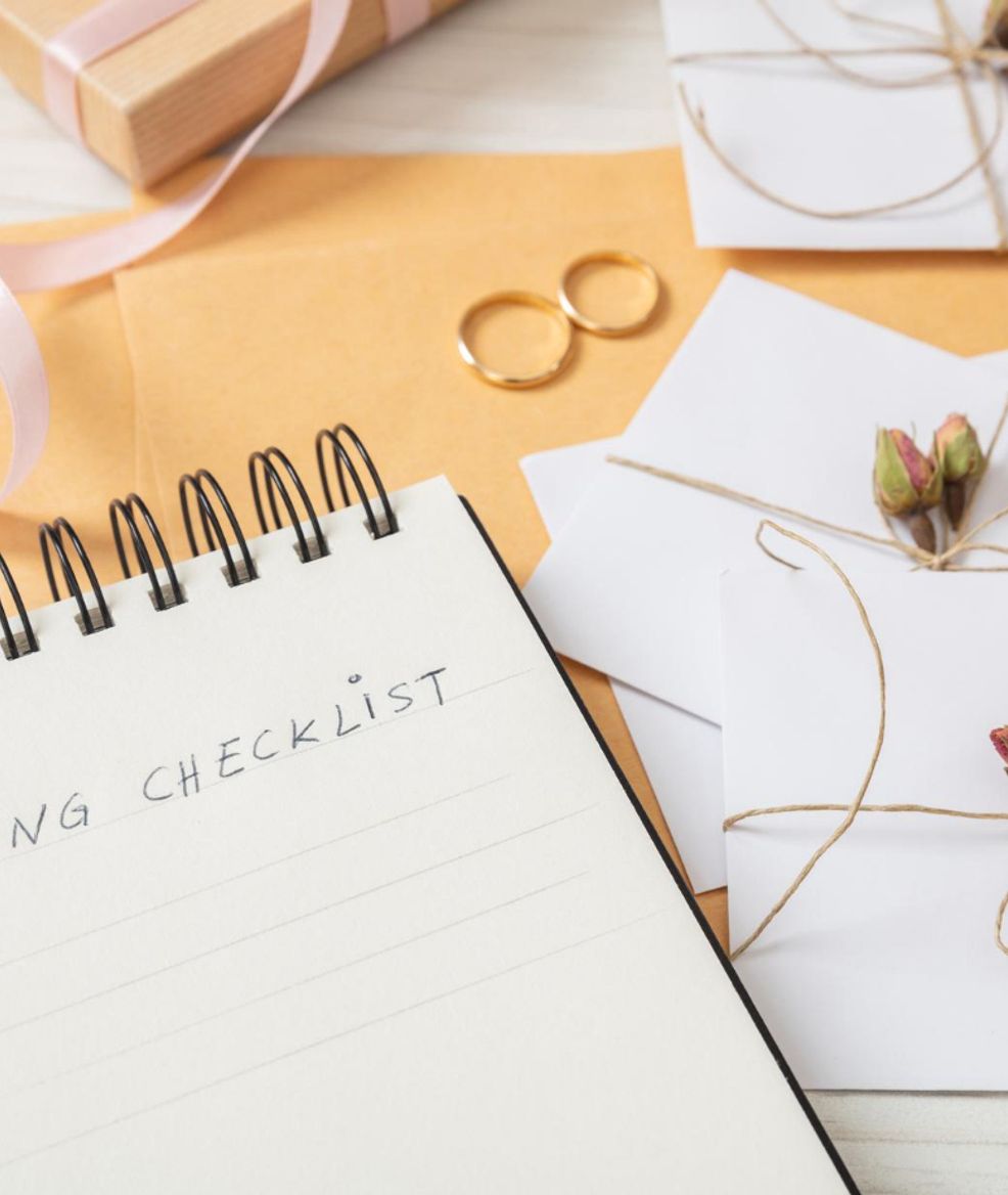 wedding checklist on a notepad